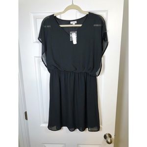Black mini dress with beaded accents